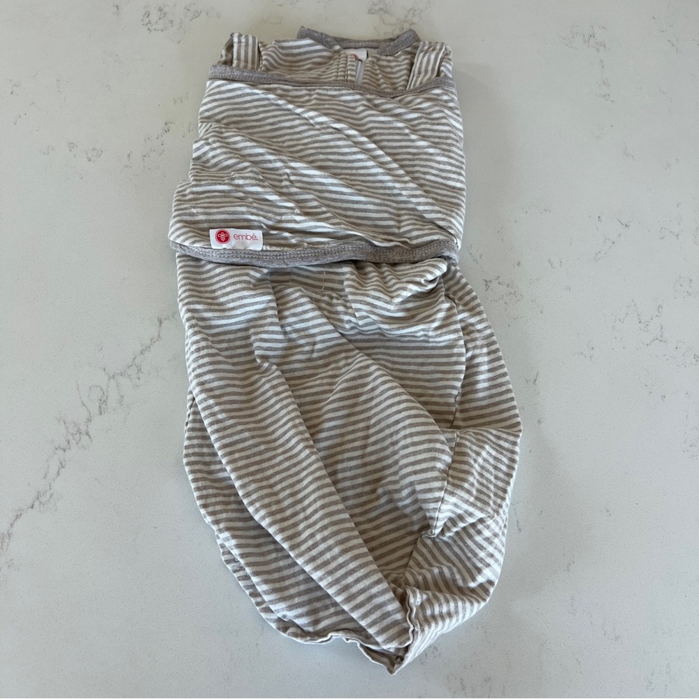 embé 2 way swaddle out sleep sack